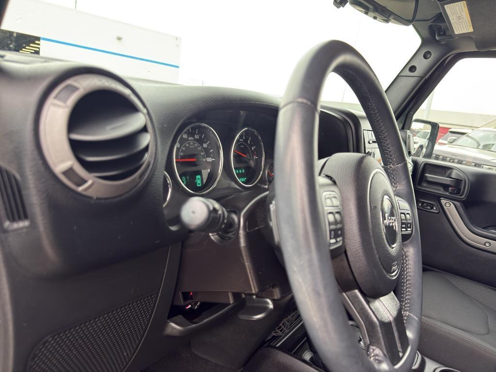 used 2015 Jeep Wrangler Unlimited car, priced at $23,995