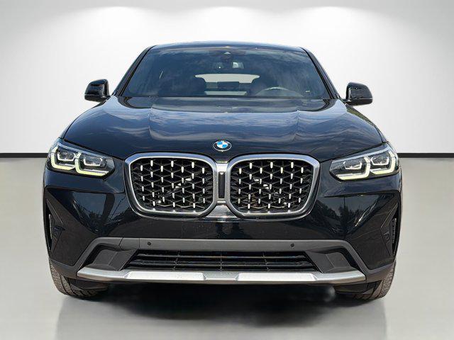 used 2022 BMW X4 car, priced at $30,679