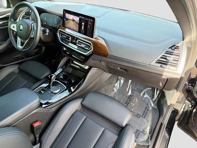 used 2022 BMW X4 car, priced at $30,679