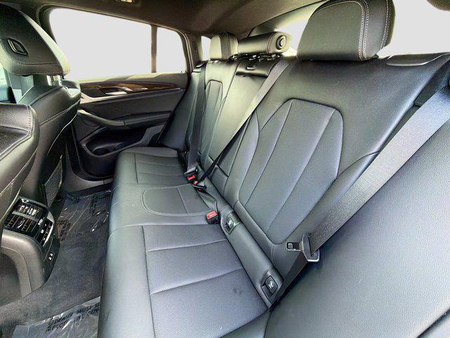used 2022 BMW X4 car, priced at $30,679