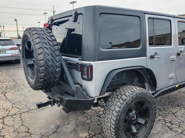 used 2014 Jeep Wrangler Unlimited car, priced at $14,850