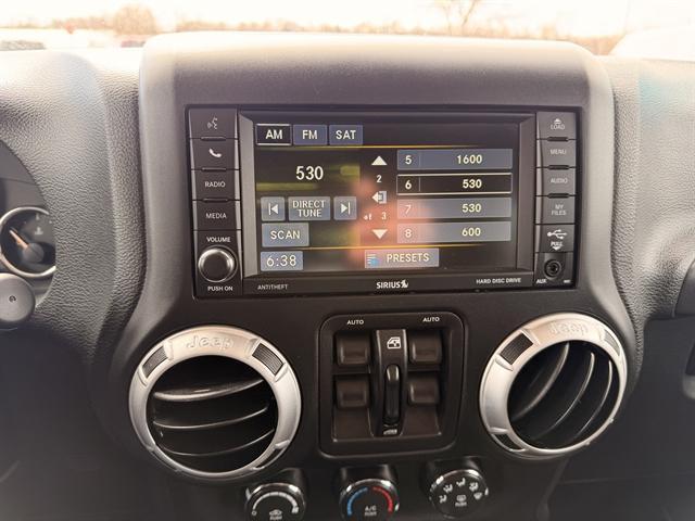 used 2015 Jeep Wrangler Unlimited car, priced at $17,490