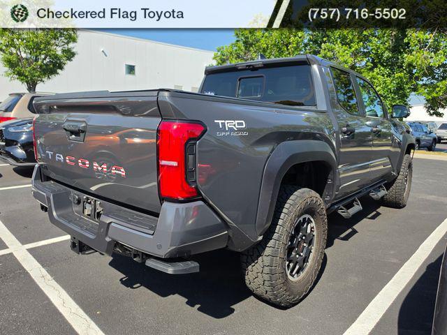 used 2025 Toyota Tacoma car, priced at $48,990