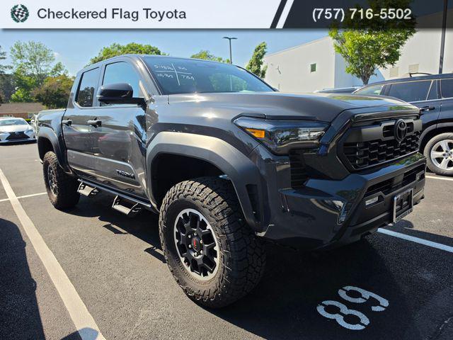 used 2025 Toyota Tacoma car, priced at $48,990