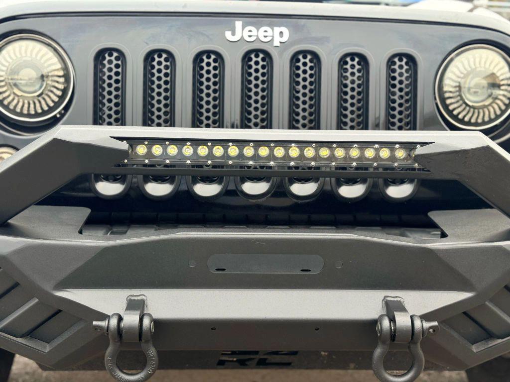 used 2012 Jeep Wrangler Unlimited car, priced at $10,999