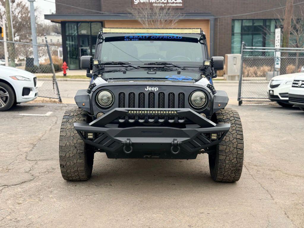 used 2012 Jeep Wrangler Unlimited car, priced at $10,999