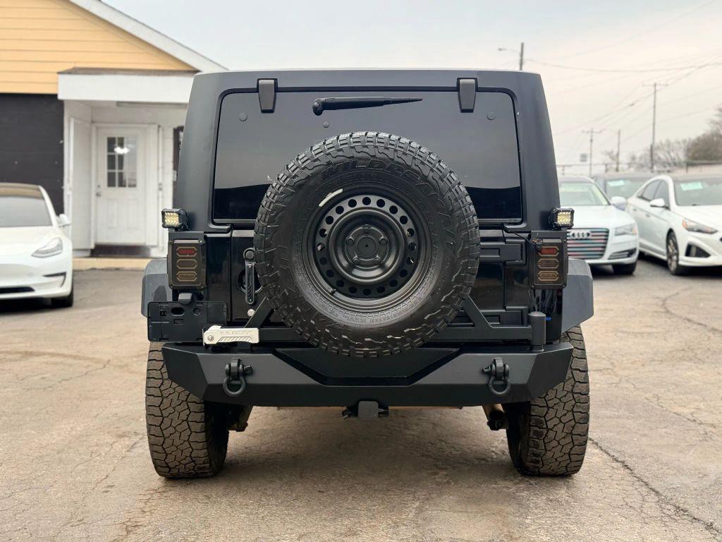 used 2012 Jeep Wrangler Unlimited car, priced at $10,999