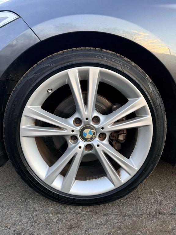 used 2014 BMW 228 car, priced at $8,999