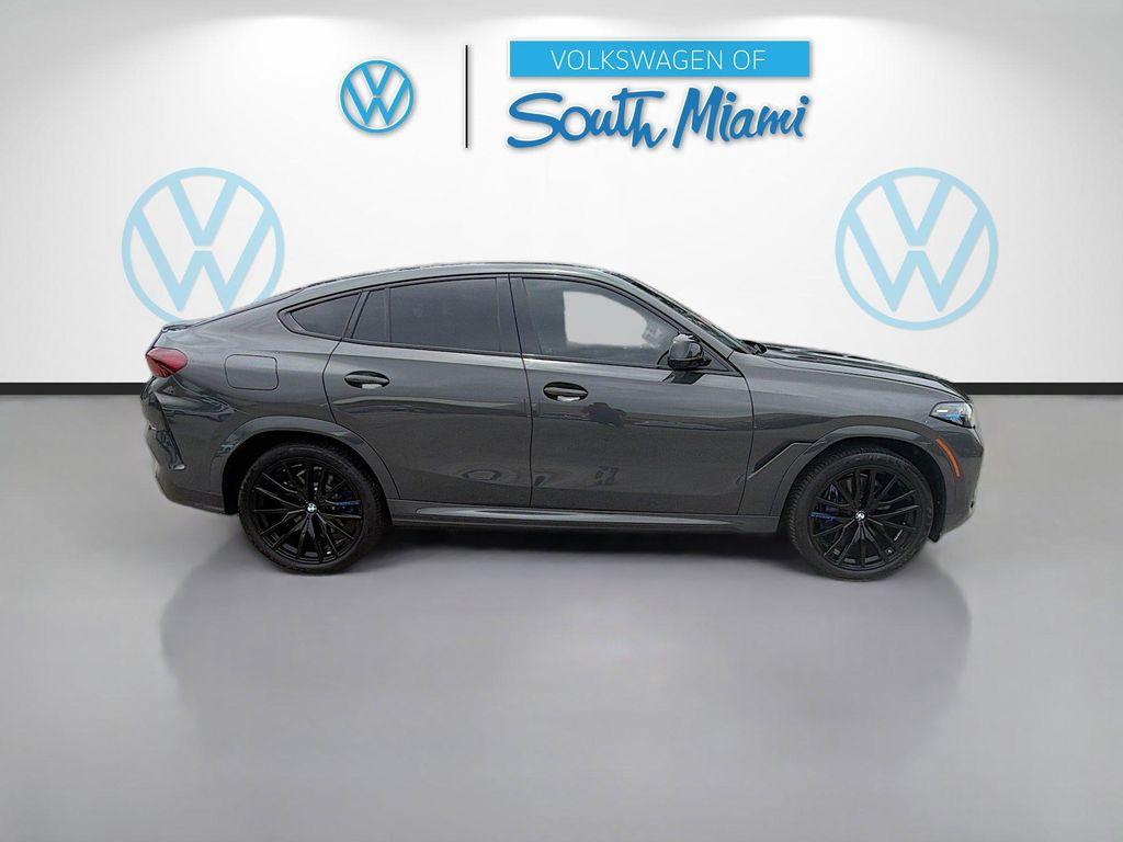 used 2024 BMW X6 car, priced at $67,857