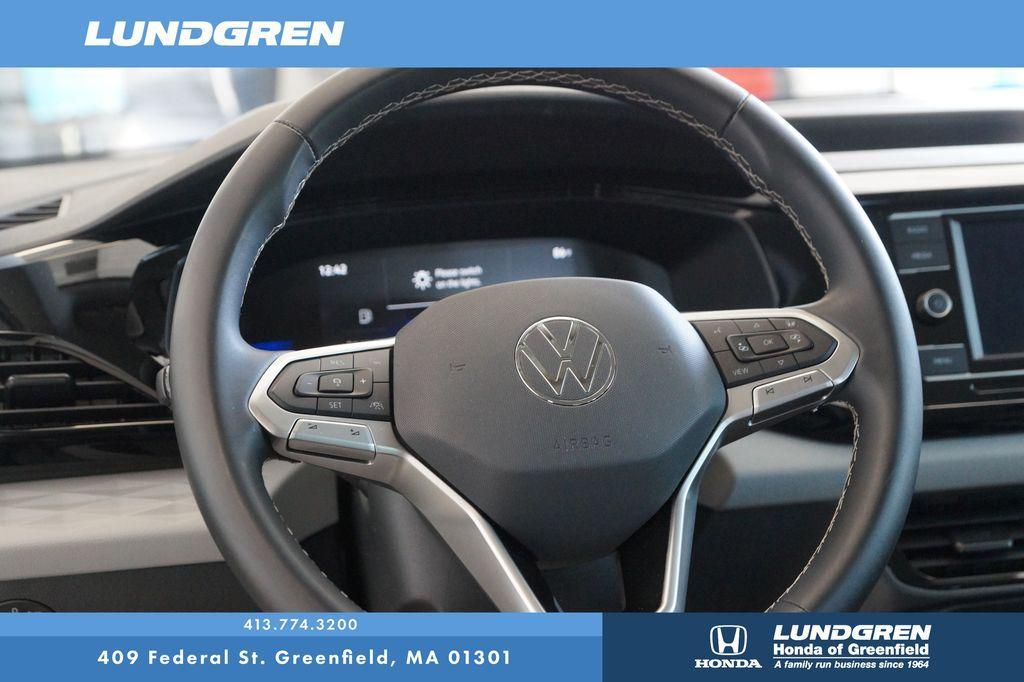 used 2024 Volkswagen Taos car, priced at $20,159