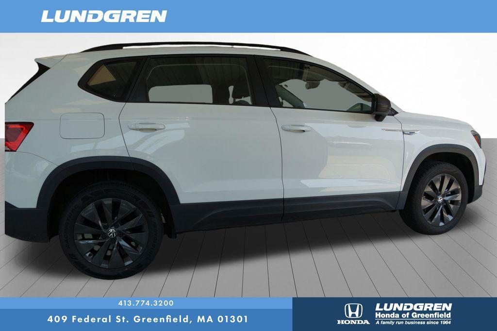 used 2024 Volkswagen Taos car, priced at $20,159