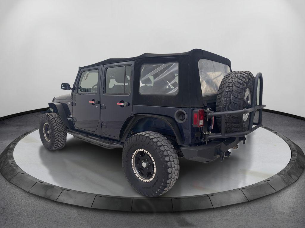 used 2013 Jeep Wrangler Unlimited car, priced at $12,991