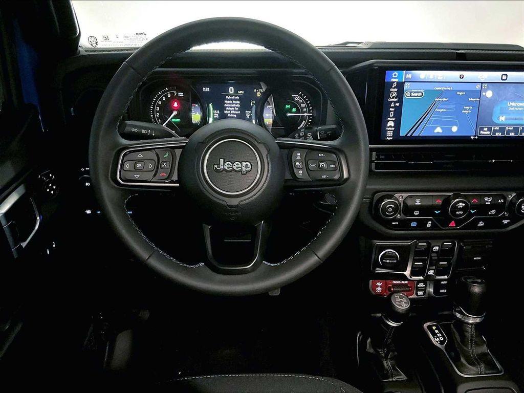 used 2024 Jeep Wrangler 4xe car, priced at $37,597
