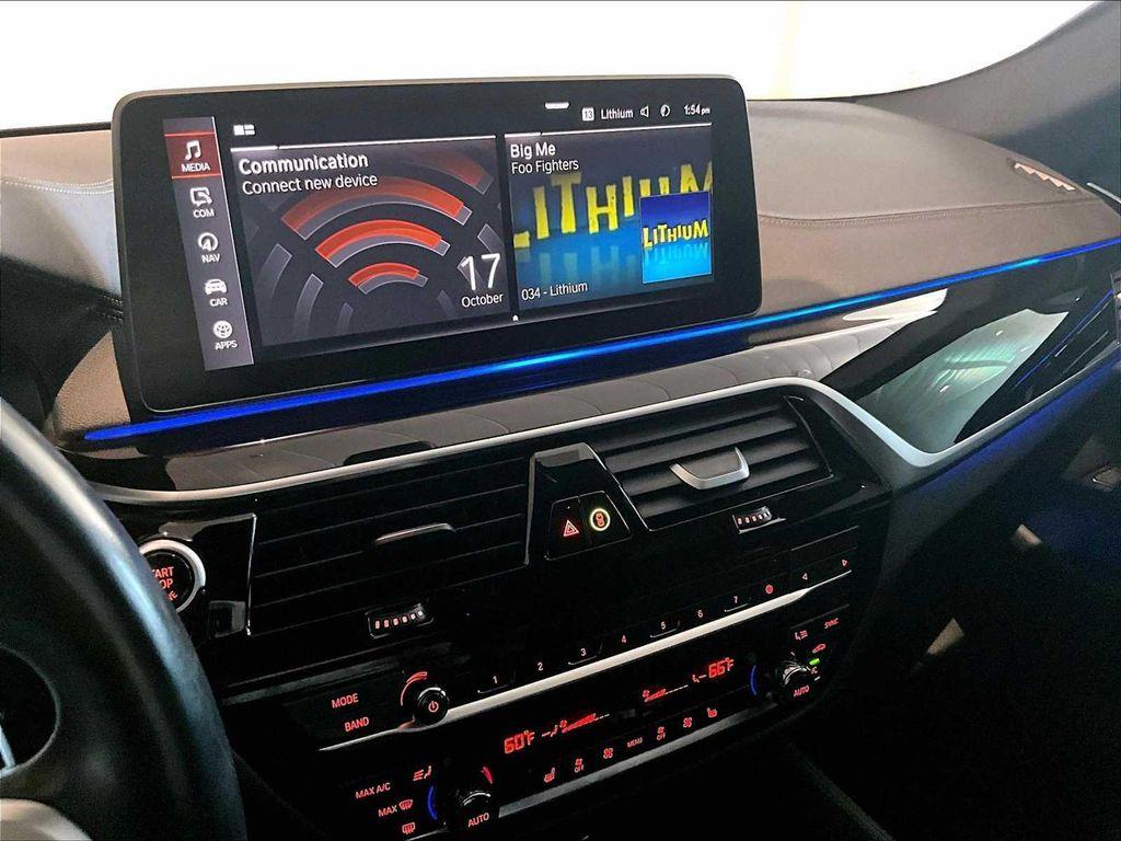 used 2023 BMW M550 car, priced at $56,978