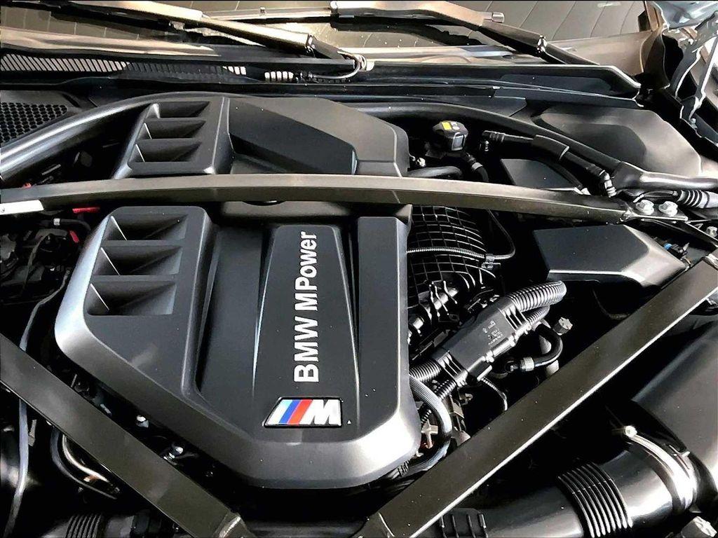 used 2022 BMW M4 car, priced at $63,399