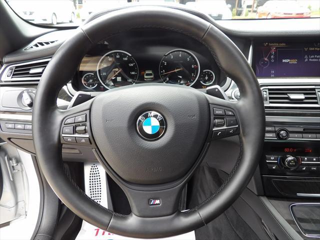 used 2015 BMW 750 car, priced at $18,995