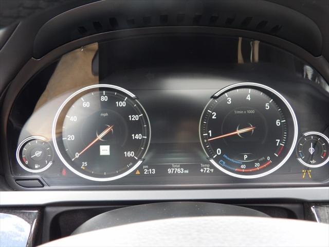 used 2015 BMW 750 car, priced at $18,995