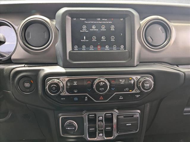 used 2023 Jeep Wrangler 4xe car, priced at $27,991