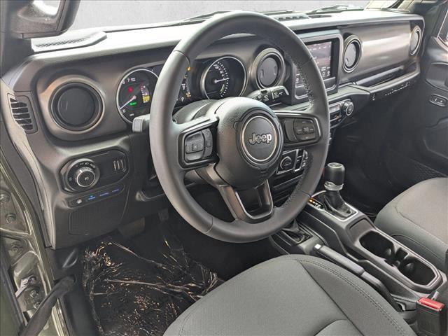 used 2023 Jeep Wrangler 4xe car, priced at $27,991