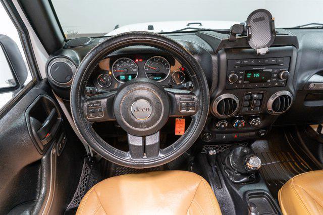 used 2015 Jeep Wrangler Unlimited car, priced at $16,900