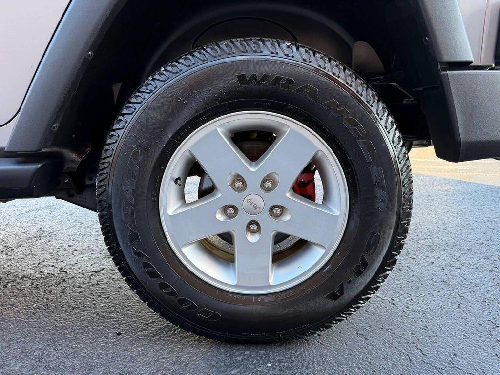 used 2013 Jeep Wrangler Unlimited car, priced at $12,900