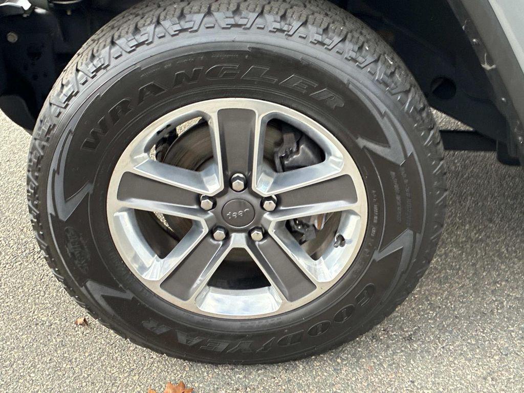 used 2021 Jeep Wrangler Unlimited car, priced at $29,394