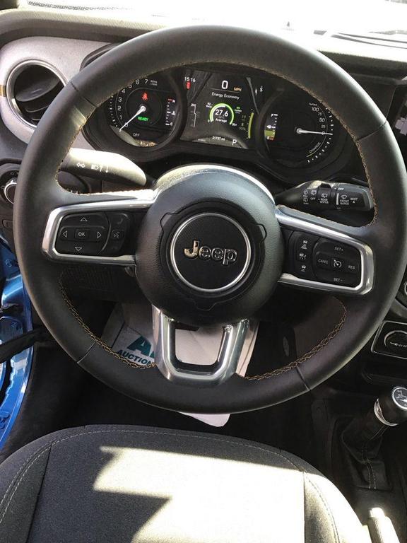 used 2024 Jeep Wrangler 4xe car, priced at $31,885