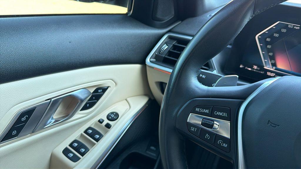 used 2023 BMW 330 car, priced at $30,900