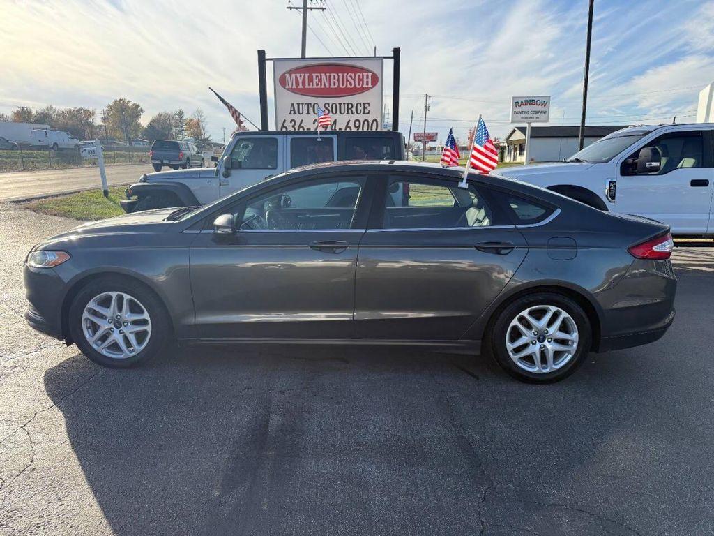 used 2015 Ford Fusion car, priced at $6,990