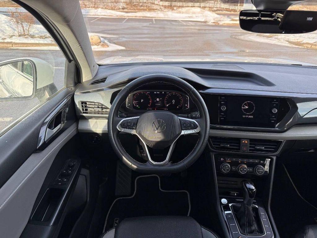 used 2023 Volkswagen Taos car, priced at $19,497