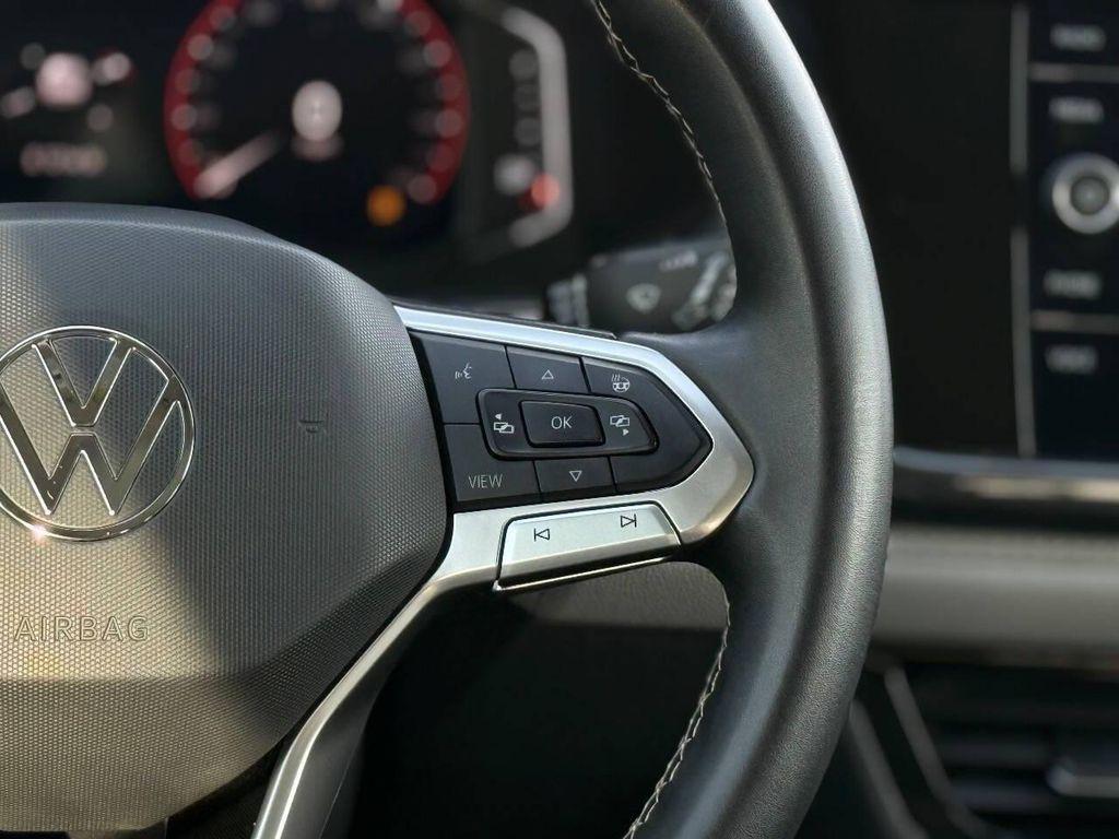 used 2023 Volkswagen Taos car, priced at $19,497