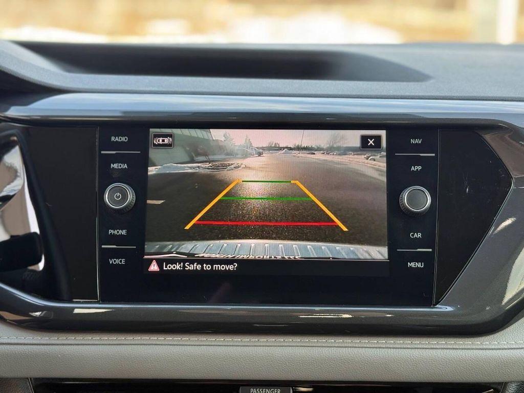 used 2023 Volkswagen Taos car, priced at $19,497