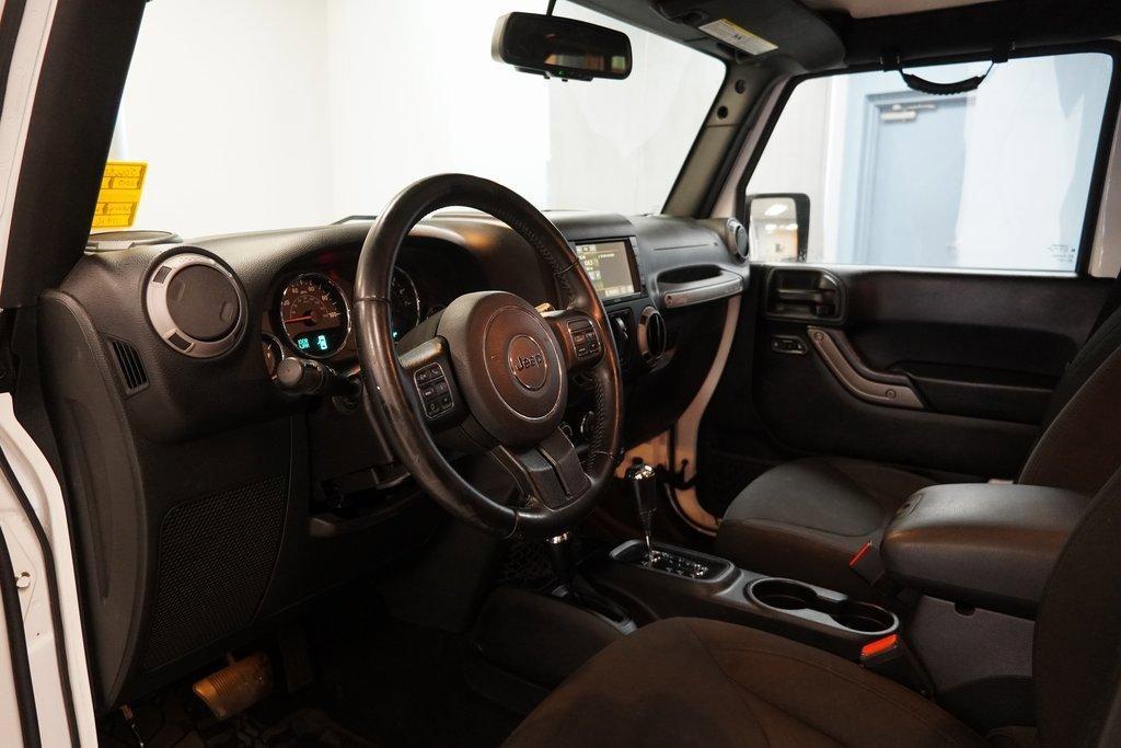 used 2015 Jeep Wrangler Unlimited car, priced at $13,400