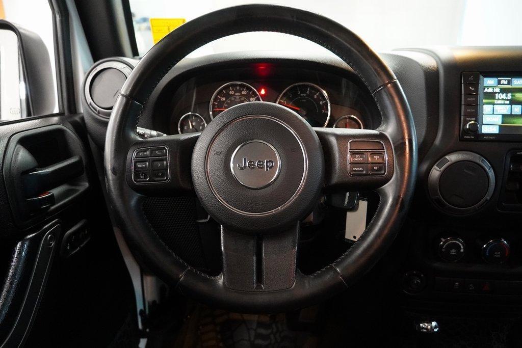 used 2015 Jeep Wrangler Unlimited car, priced at $13,400