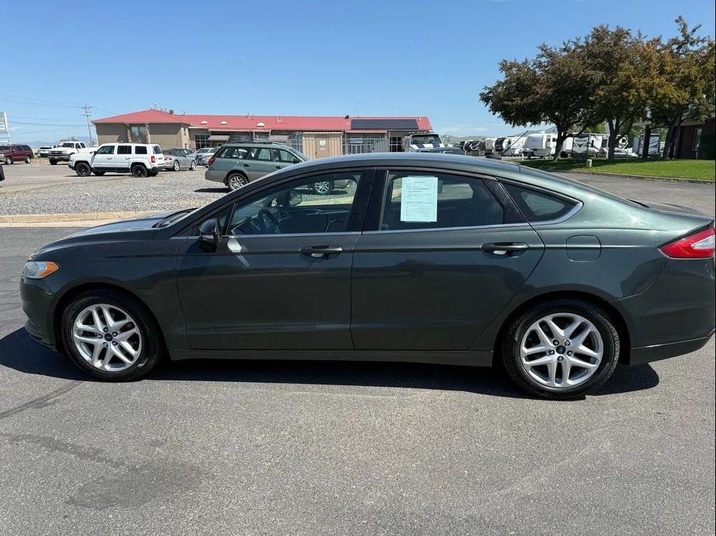 used 2015 Ford Fusion car, priced at $6,995