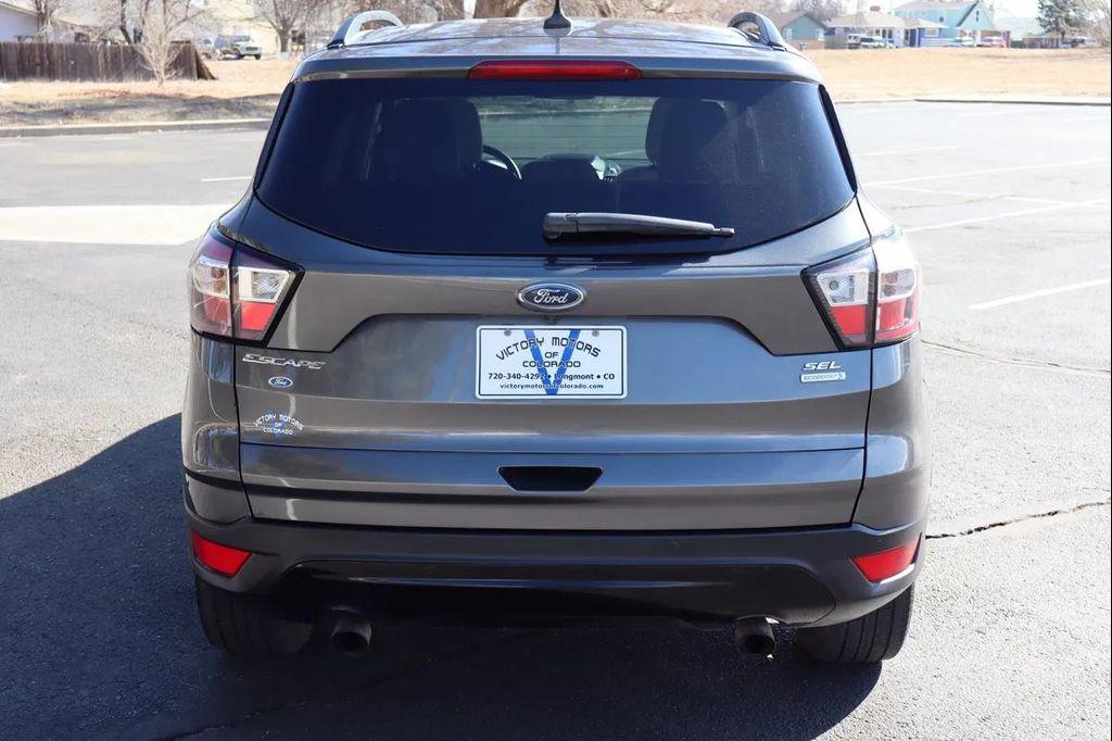 used 2018 Ford Escape car, priced at $8,999