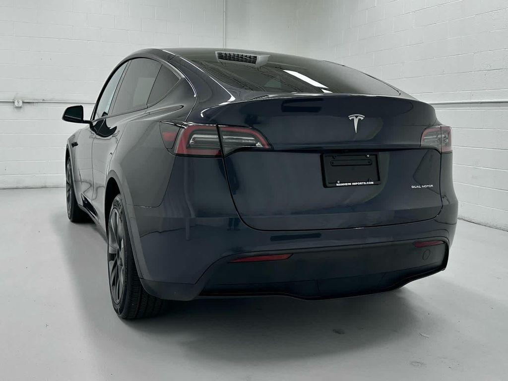 used 2025 Tesla Model Y car, priced at $39,999