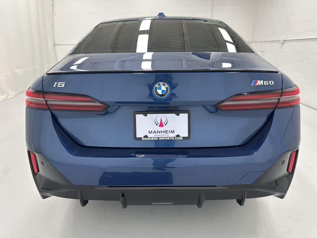 used 2024 BMW i5 car, priced at $58,999