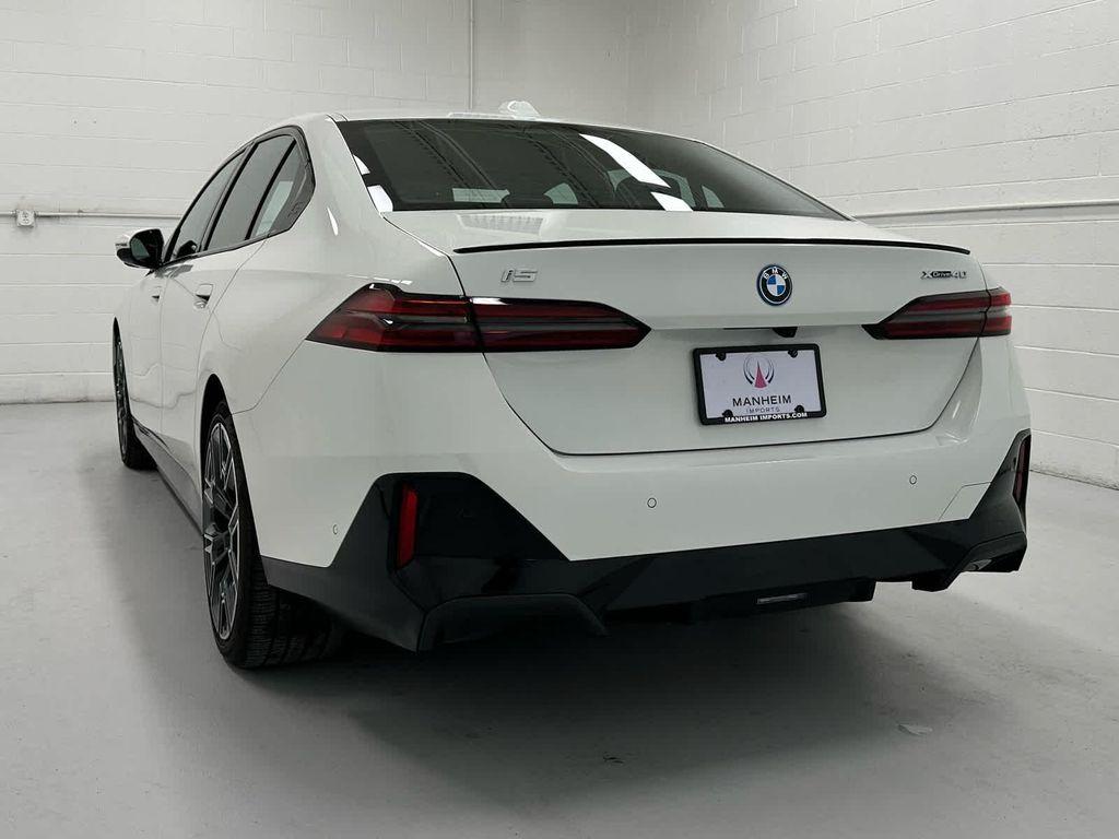 used 2025 BMW i5 car, priced at $61,999