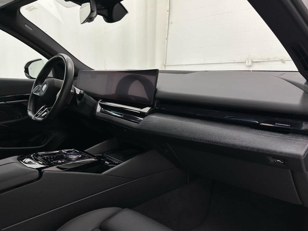 used 2025 BMW i5 car, priced at $61,999