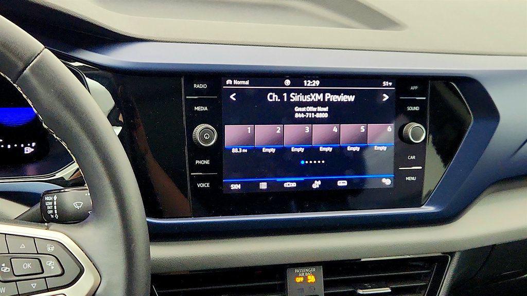 used 2023 Volkswagen Taos car, priced at $20,995