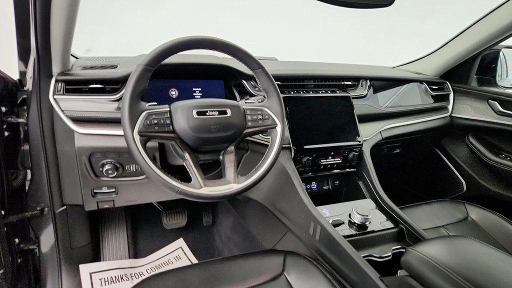 used 2023 Jeep Grand Cherokee 4xe car, priced at $23,495