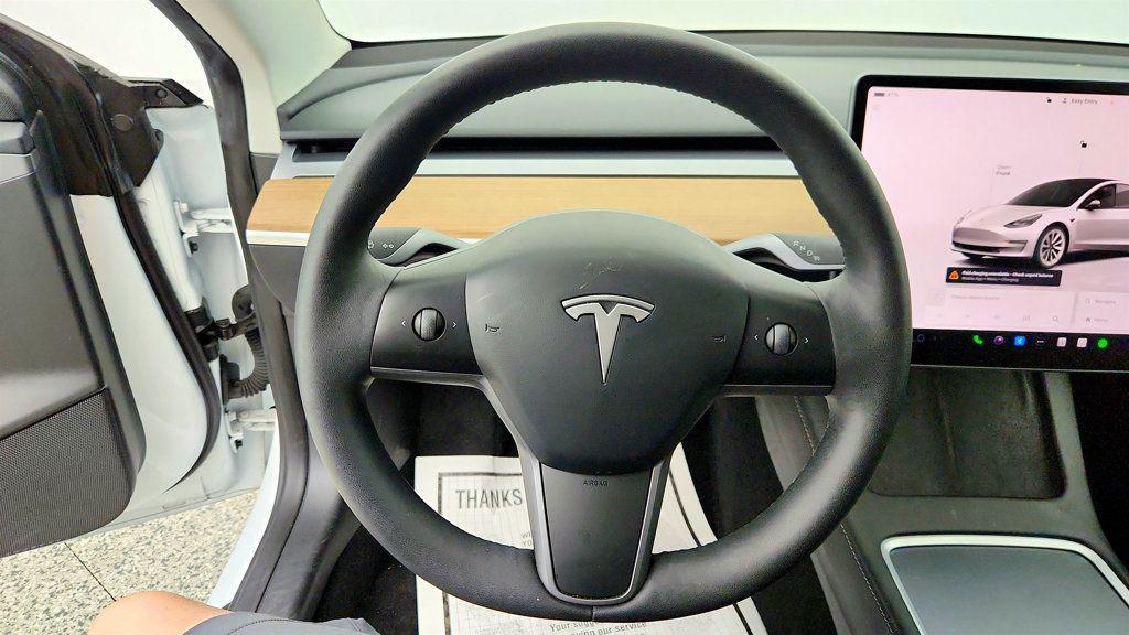 used 2023 Tesla Model 3 car, priced at $23,495
