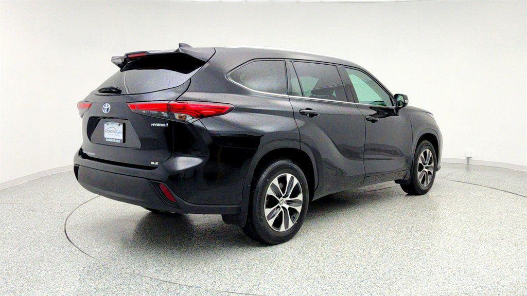 used 2021 Toyota Highlander Hybrid car, priced at $30,995