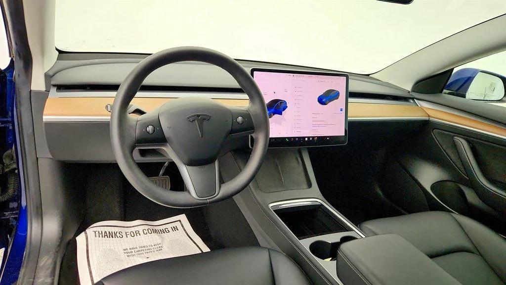 used 2023 Tesla Model 3 car, priced at $22,495