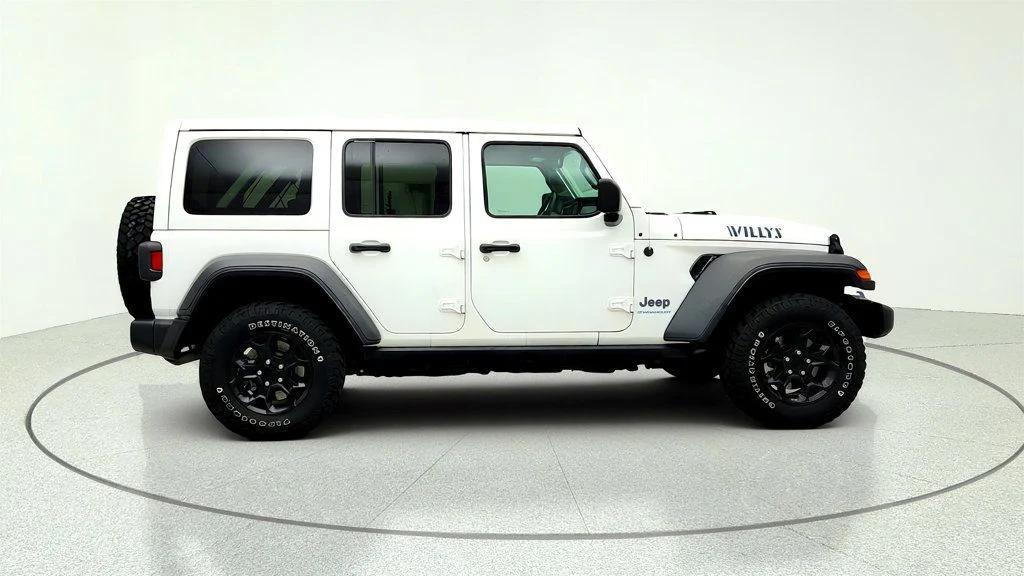 used 2023 Jeep Wrangler 4xe car, priced at $27,594