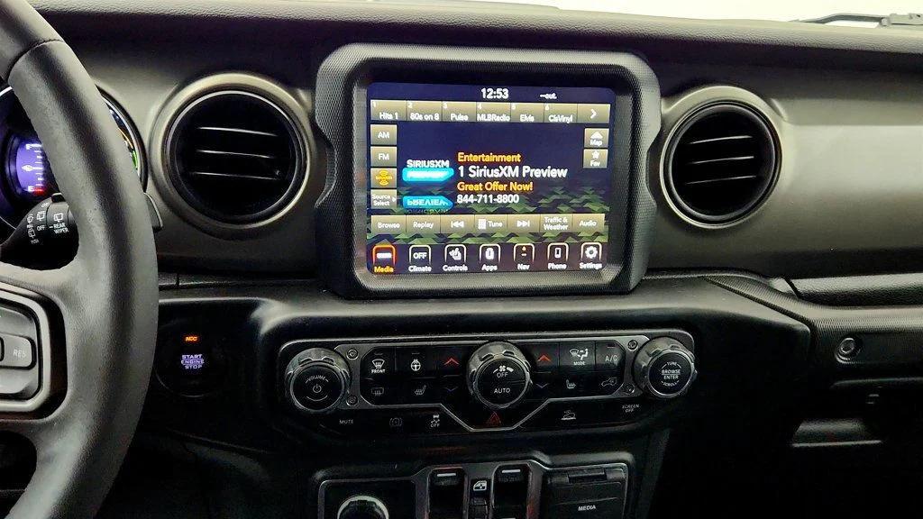 used 2023 Jeep Wrangler 4xe car, priced at $27,594