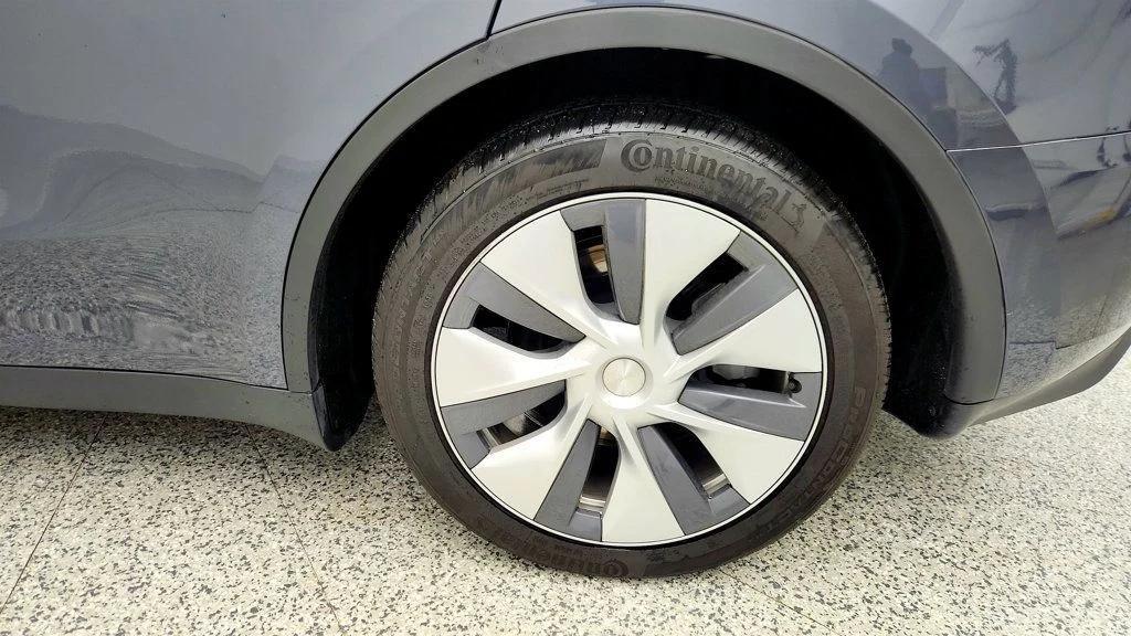 used 2023 Tesla Model Y car, priced at $28,995