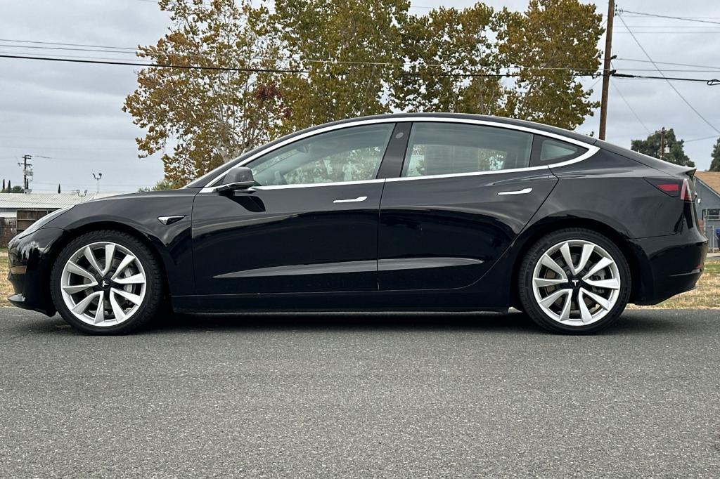 used 2018 Tesla Model 3 car, priced at $24,200