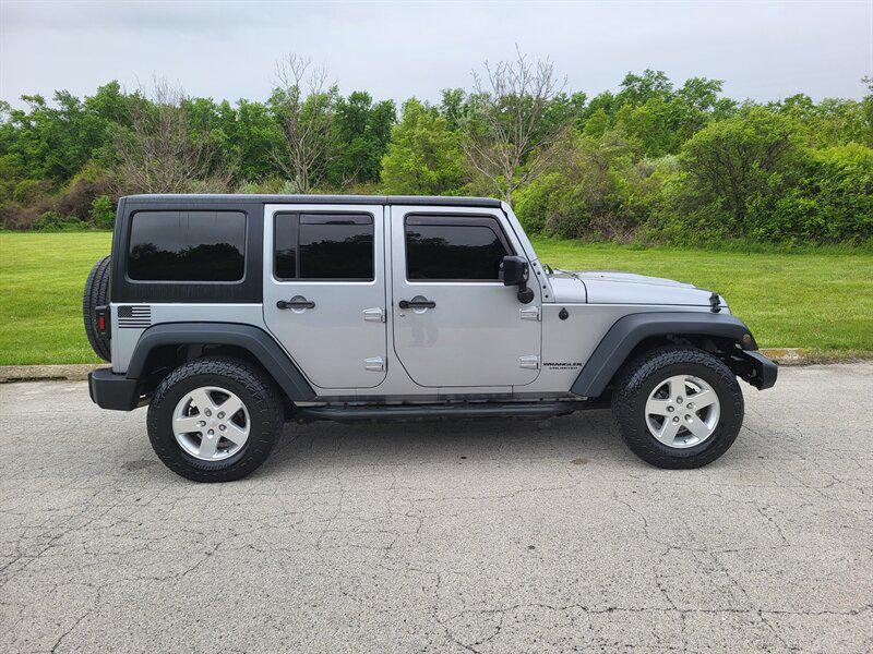 used 2015 Jeep Wrangler Unlimited car, priced at $12,995